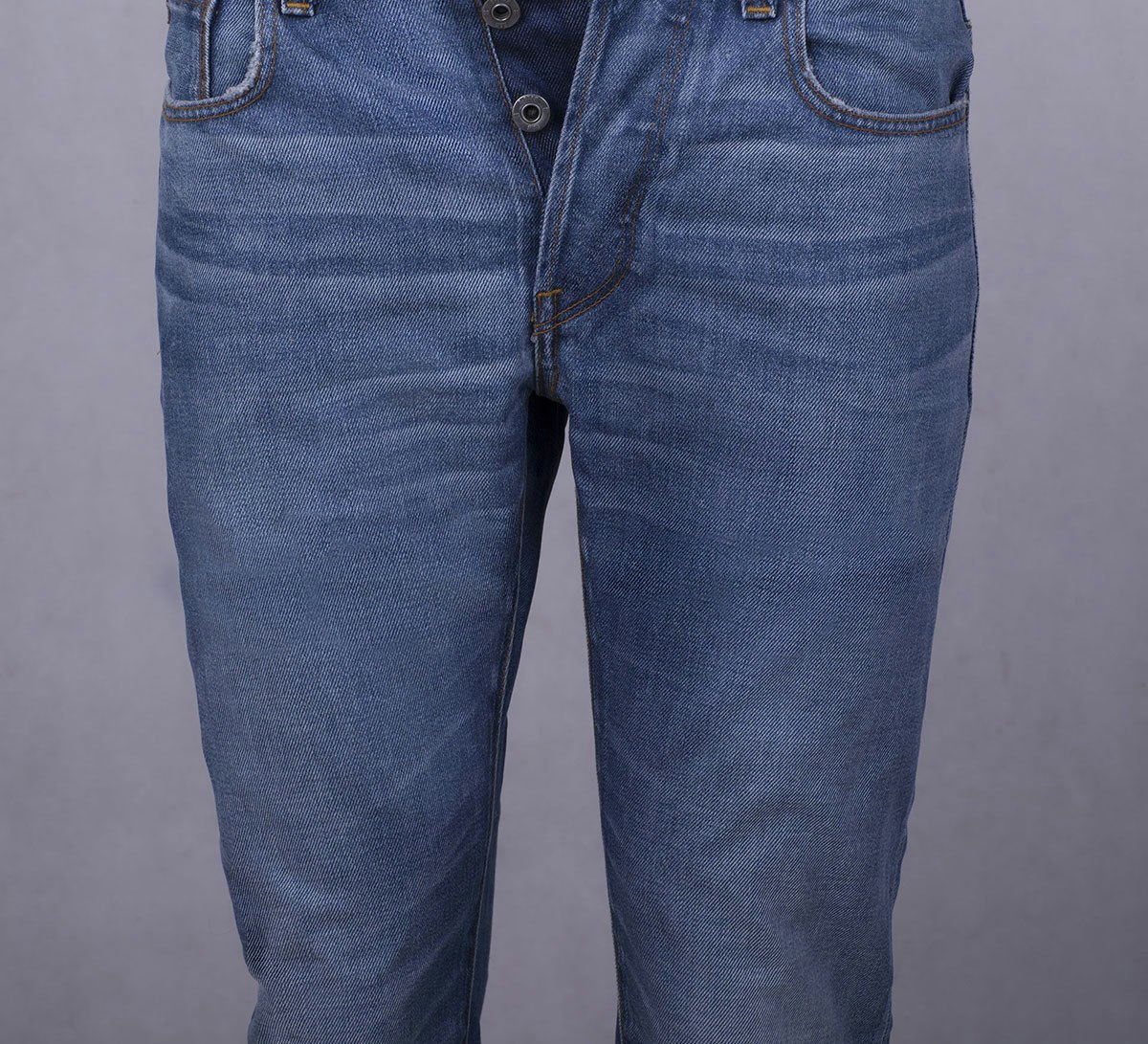 jeans-retouching-packaging-crease-removal-after The same product photo of jeans, after retouching to remove packaging creases